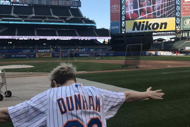 Lena Dunham Instagrammed this picture, "Check out my Insta stories for my first sports game EVER IN MY LIFE ⚾️ #letsgomets"